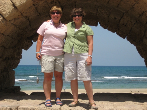Deena Candler and Loril Hawk on the foundation of the aqueduct at Caesarea Maritime
